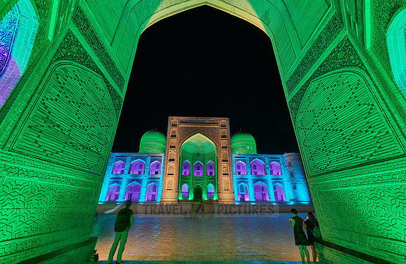 colorful illuminated ensemble of Mir-i Arab-Madressa Kalyan-Mosque and minaret