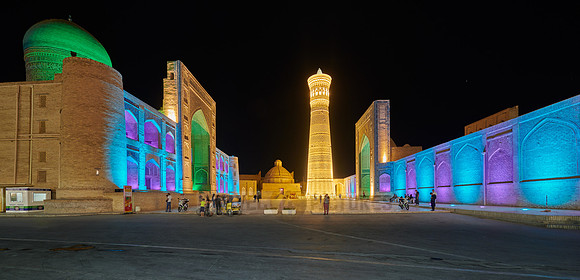 colorful illuminated ensemble of Mir-i Arab-Madressa Kalyan-Mosque and minaret