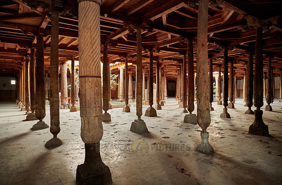 old wooden columns in Djuma Mosque old town Khiva