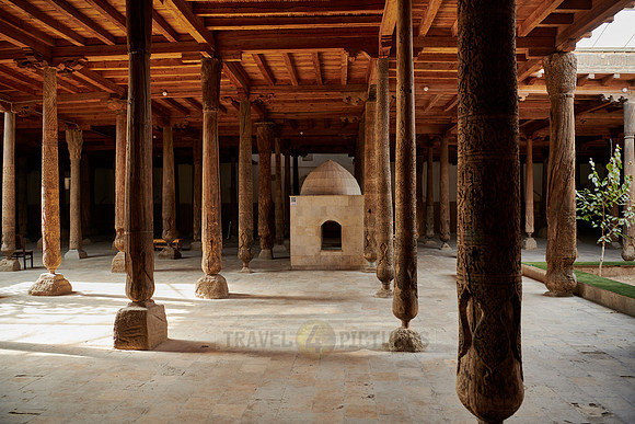 old wooden columns in Djuma Mosque old town Khiva