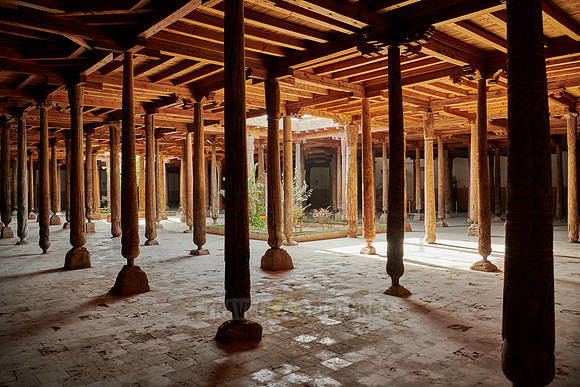 old wooden columns in Djuma Mosque old town Khiva