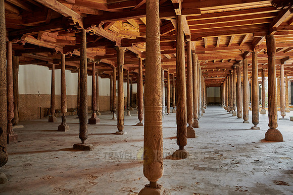 old wooden columns in Djuma Mosque old town Khiva
