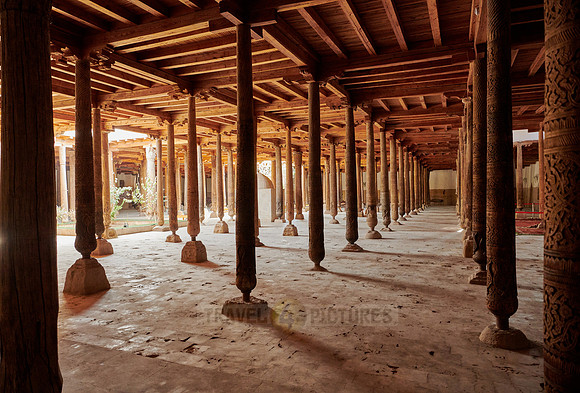old wooden columns in Djuma Mosque old town Khiva