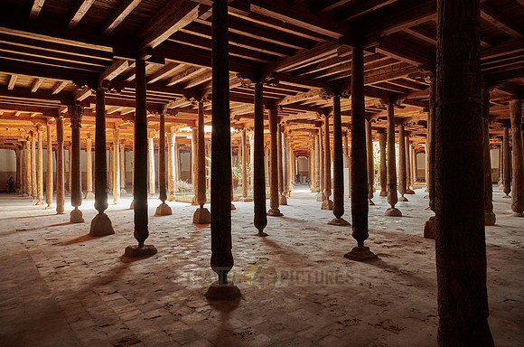 old wooden columns in Djuma Mosque old town Khiva