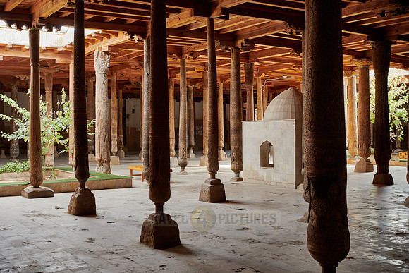 old wooden columns in Djuma Mosque old town Khiva