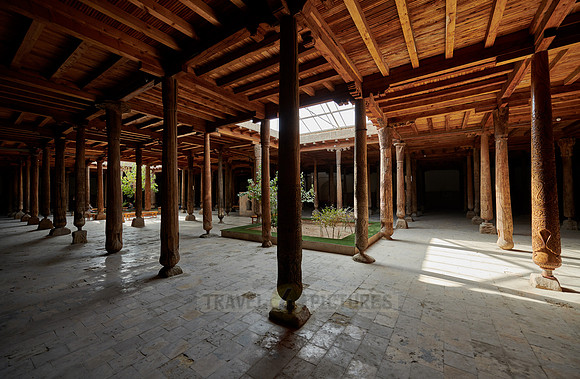old wooden columns in Djuma Mosque old town Khiva