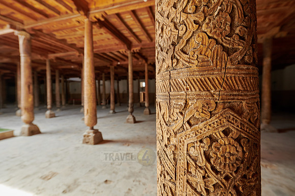 old wooden columns in Djuma Mosque old town Khiva