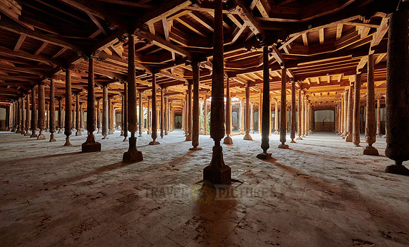 old wooden columns in Djuma Mosque old town Khiva