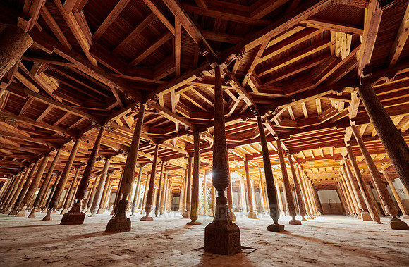 old wooden columns in Djuma Mosque old town Khiva