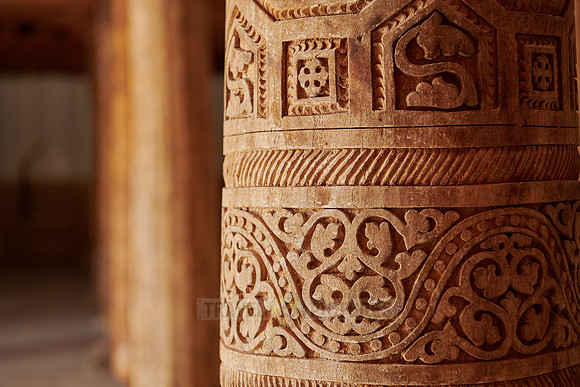 old wooden columns in Djuma Mosque old town Khiva