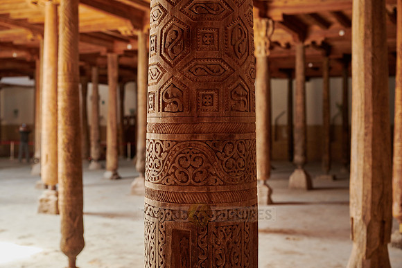 old wooden columns in Djuma Mosque old town Khiva