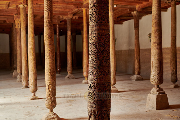 old wooden columns in Djuma Mosque old town Khiva