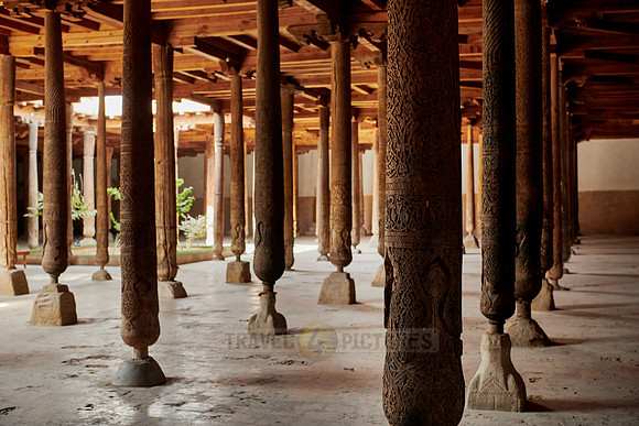 old wooden columns in Djuma Mosque old town Khiva