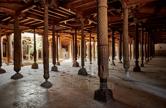 old wooden columns in Djuma Mosque old town Khiva