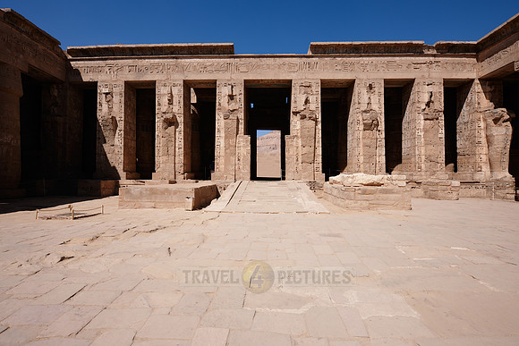 Columns of god Osiris at western colonade in second yard
