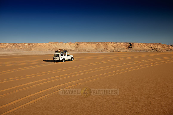 4x4 offroad car in desert landscape