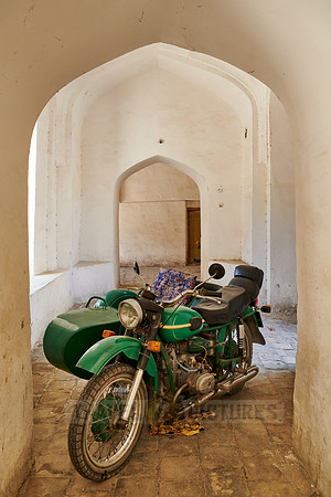 old motorcycle in Madari Khan Madrassah, Bukhara