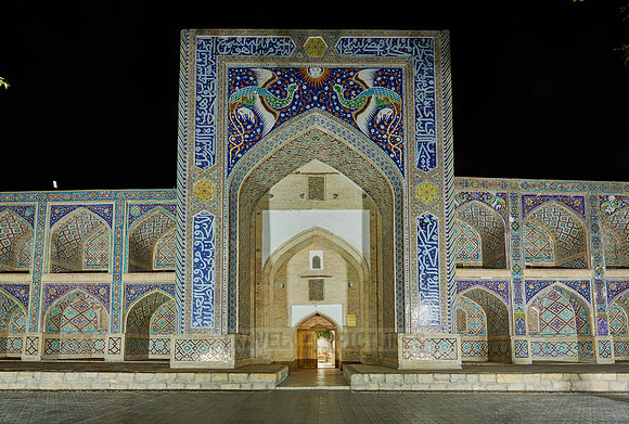 night shot of beautifully decorated Nadir Divan Begi madrassah