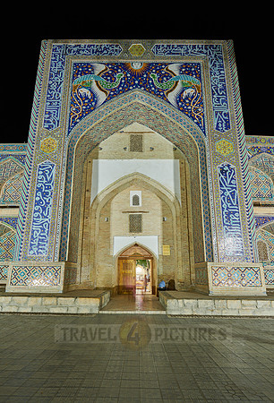 night shot of beautifully decorated Nadir Divan Begi madrassah