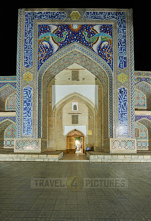 night shot of beautifully decorated Nadir Divan Begi madrassah