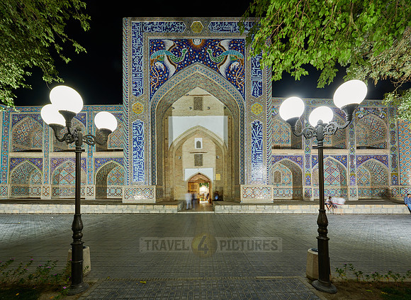 night shot of beautifully decorated Nadir Divan Begi madrassah