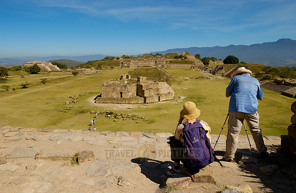 observatory and visitors in front of Pyramids of Monte Alban