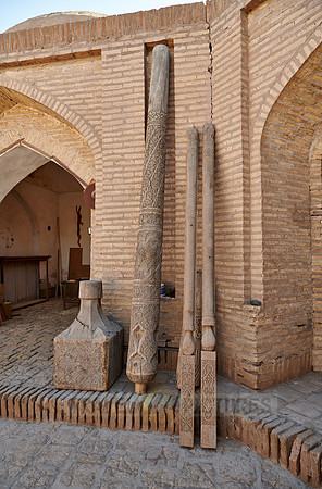 Carved wooden pillars in a carpentry shop in the old town Itchan-Kala