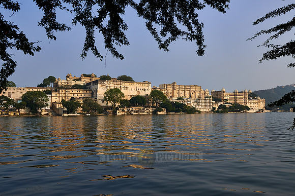 panorama shot over Lake Pichola onto City palace and Taj Fateh Prakash Palace of Udaipur