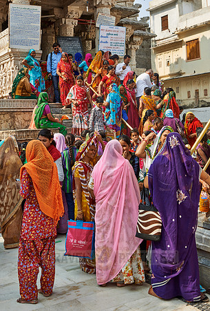 indian women with colorful clothes during ceremony inside Jagdish Temple