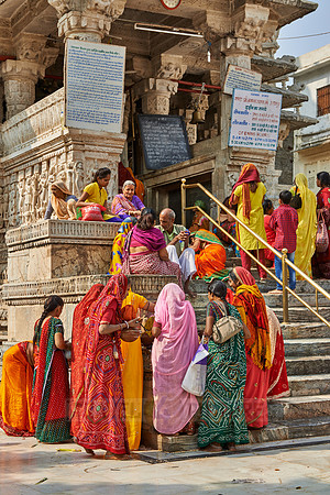 indian women with colorful clothes during ceremony inside Jagdish Temple