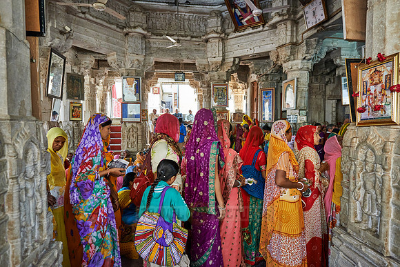 indian women with colorful clothes during ceremony inside Jagdish Temple