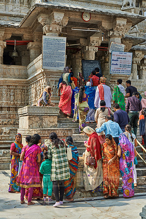 indian women with colorful clothes during ceremony inside Jagdish Temple