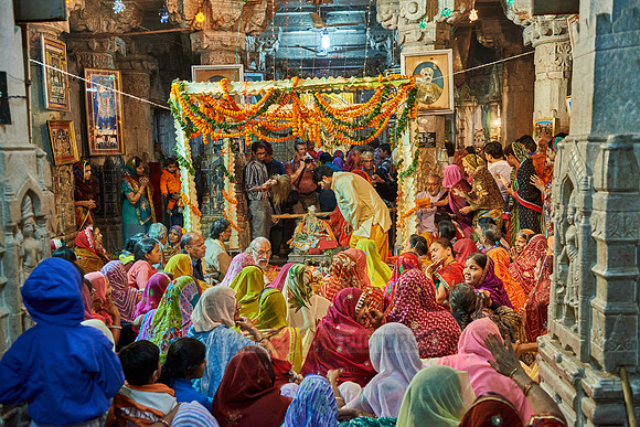 indian women with colorful clothes during ceremony inside Jagdish Temple