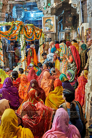 indian women with colorful clothes during ceremony inside Jagdish Temple