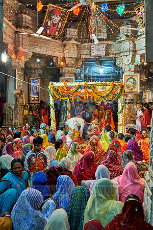 indian women with colorful clothes during ceremony inside Jagdish Temple