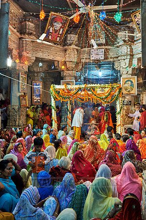indian women with colorful clothes during ceremony inside Jagdish Temple