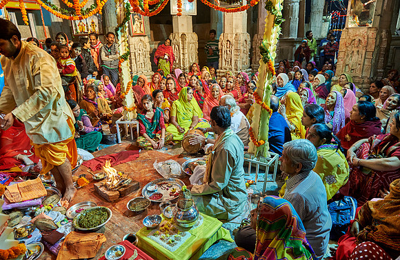indian women with colorful clothes during ceremony inside Jagdish Temple