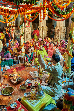 indian women with colorful clothes during ceremony inside Jagdish Temple