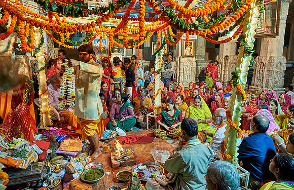 indian women with colorful clothes during ceremony inside Jagdish Temple