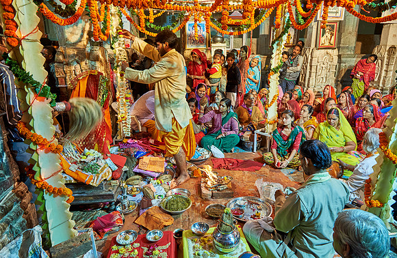 indian women with colorful clothes during ceremony inside Jagdish Temple