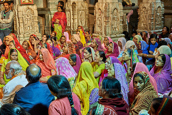 indian women with colorful clothes during ceremony inside Jagdish Temple