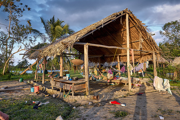 native people in wooden house on stilts of Warao indians