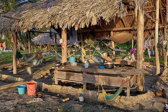 native people in wooden house on stilts of Warao indians