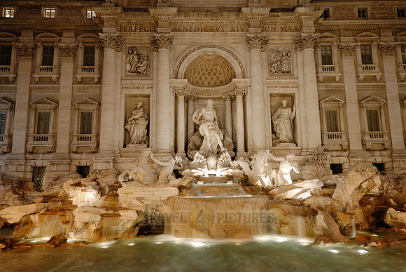 illuminated Trevi Fountain at night