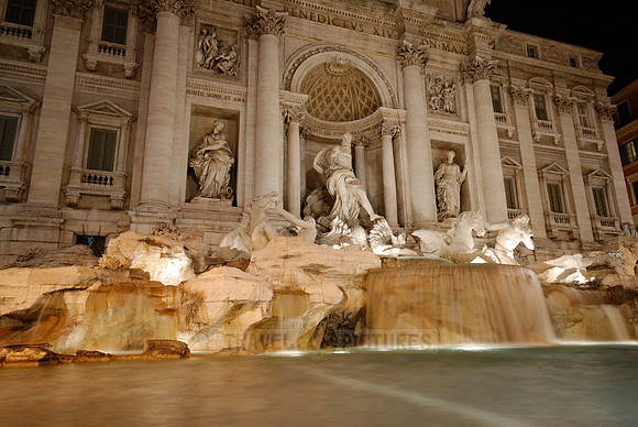 illuminated Trevi Fountain at night