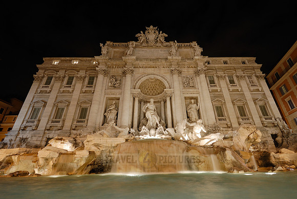 illuminated Trevi Fountain at night