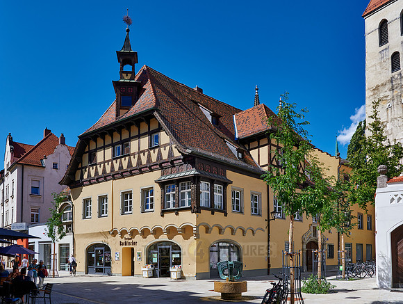 Bachfischer tea house and church tower of the Collegiate Monastery of our Lady of the Old Chapel