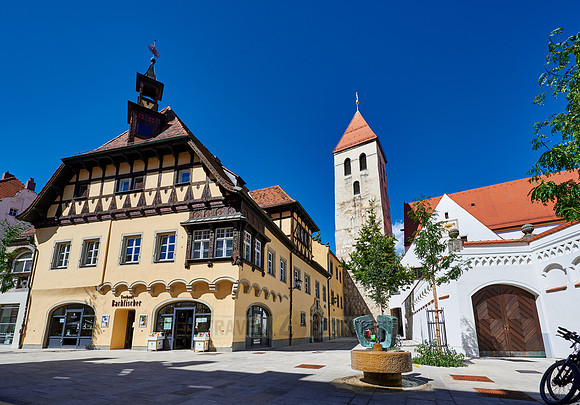 Bachfischer tea house and church tower of the Collegiate Monastery of our Lady of the Old Chapel