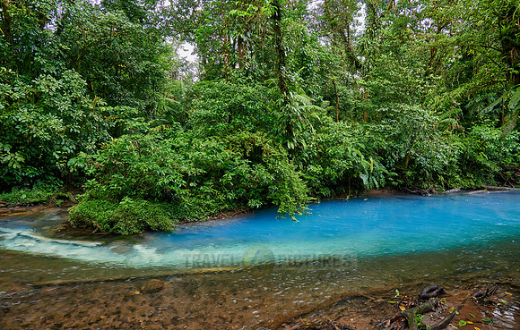 the confluence of two rivers the blue river Rio Celeste is formed