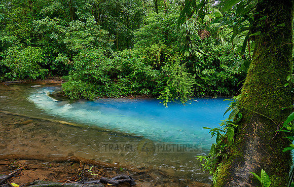 the confluence of two rivers the blue river Rio Celeste is formed